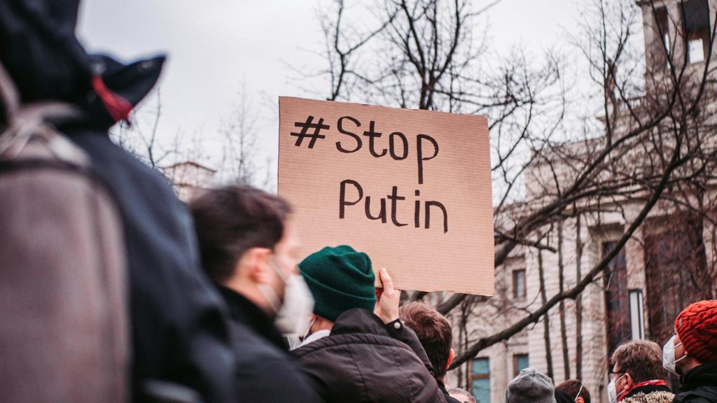 people in the street protesting against war