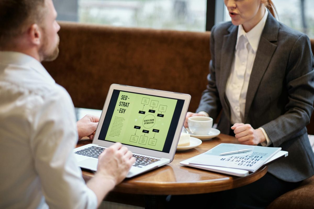 man and woman in a meeting